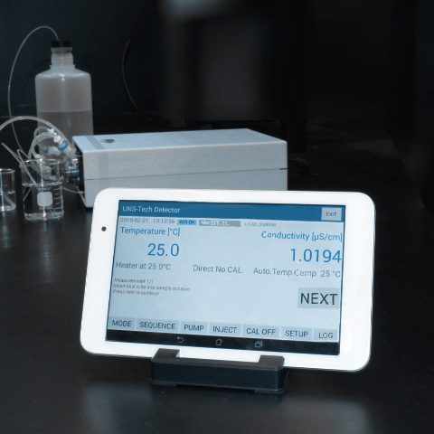Tablet interface showing conductivity readings